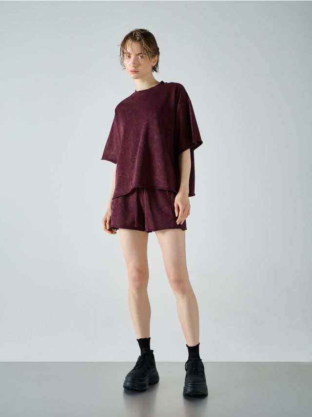 WASHED SHORTS WITH RAW EDGE
