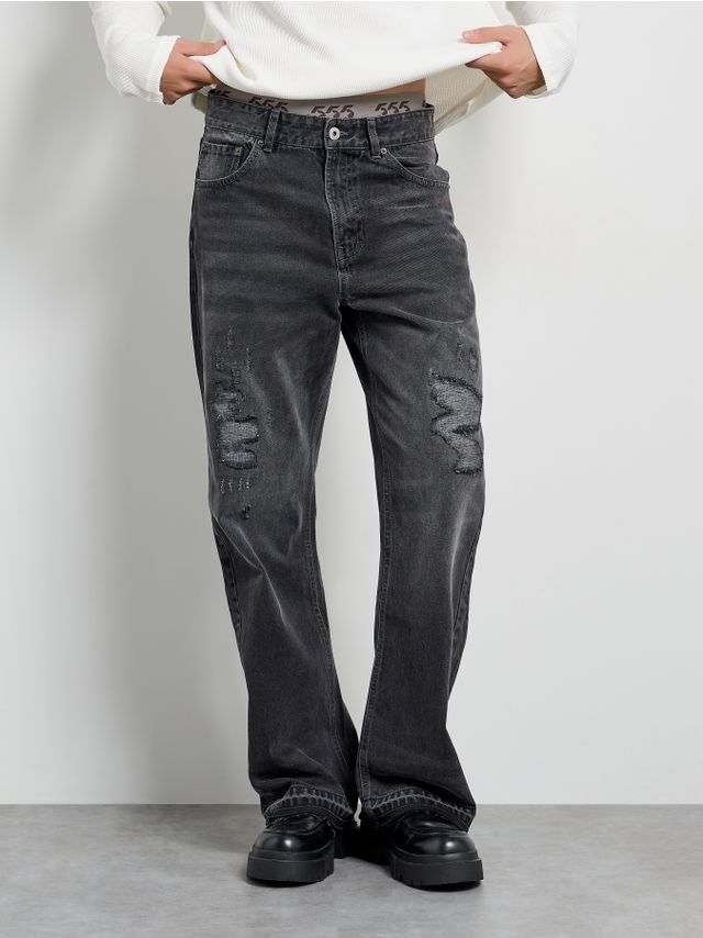 BOOTCUT RIPPED JEANS