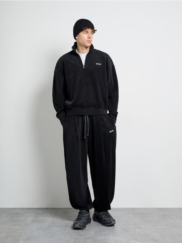 WIDE RIBBED TROUSERS WITH ELASTIC WAISTBAND AND DRAWSTRING