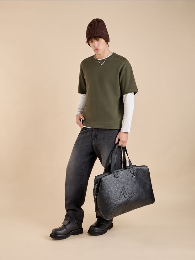 WIDE-LEG JEANS WITH RAISED LETTERING APPLIQUÉ AND WASHED EFFECT